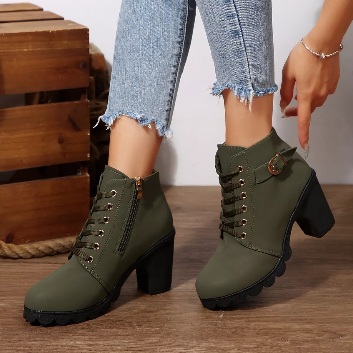 Lace up block heel suede boots styled on model