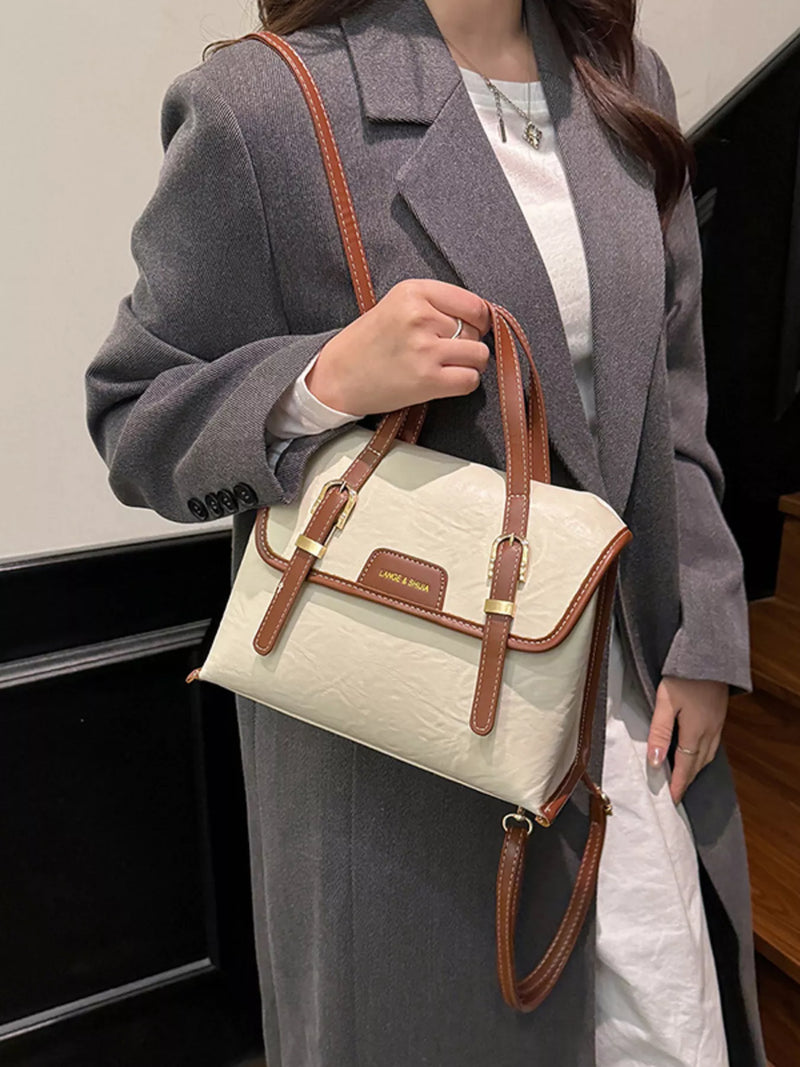 Leather flap backpack in cream front view