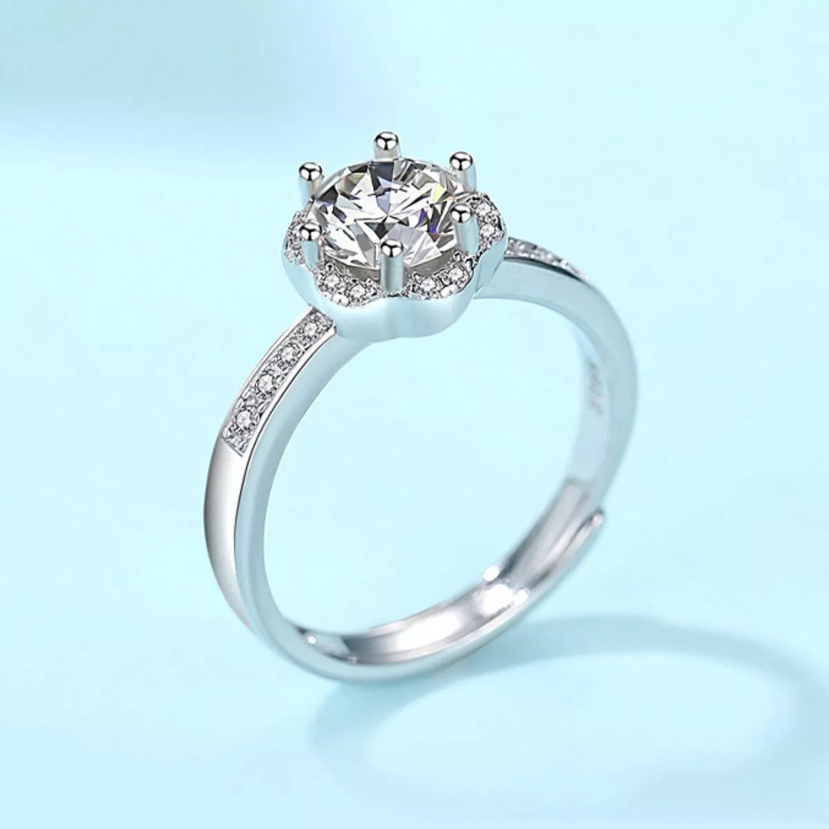 Moissanite sterling silver ring shown from the side