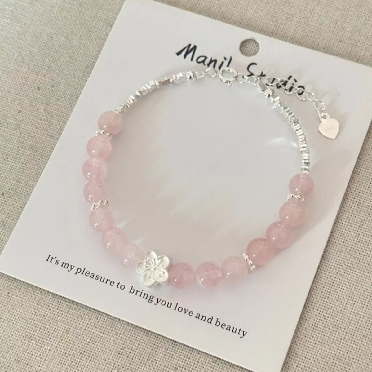 Blush pink beaded flower bracelet detail