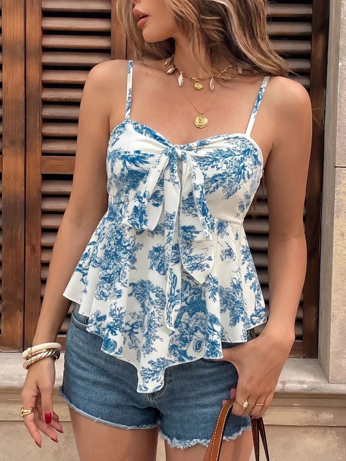 Blue floral tie front ruffle hem cami front view