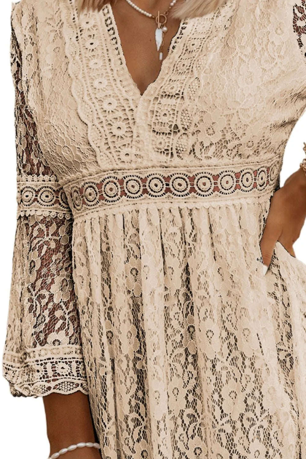 Lace dress texture and neckline detail