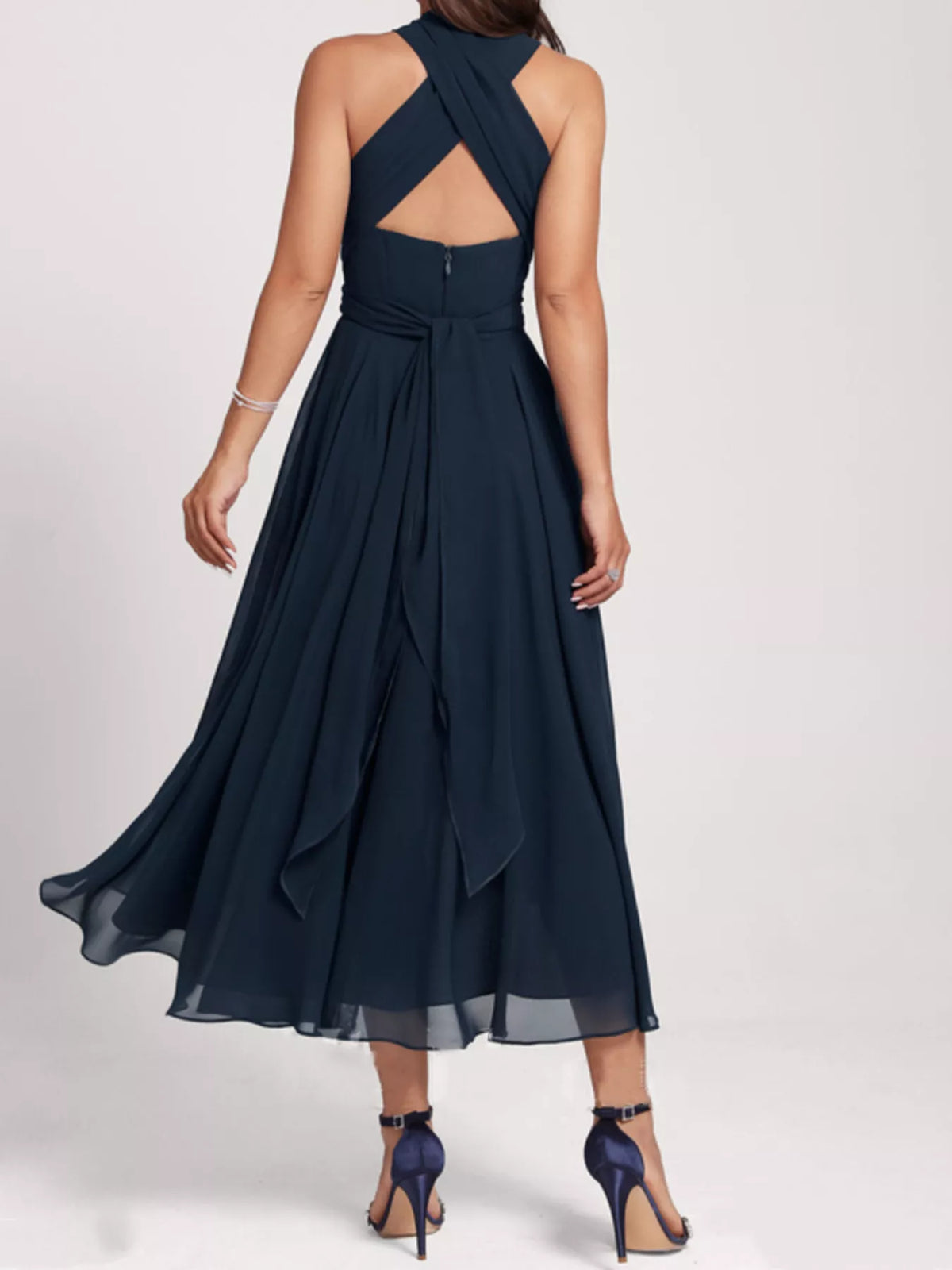 Back view of ruched midi dress with zip closure
