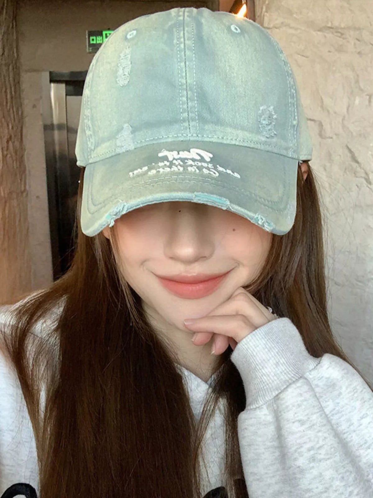 Side view of the cotton baseball cap showing the brim