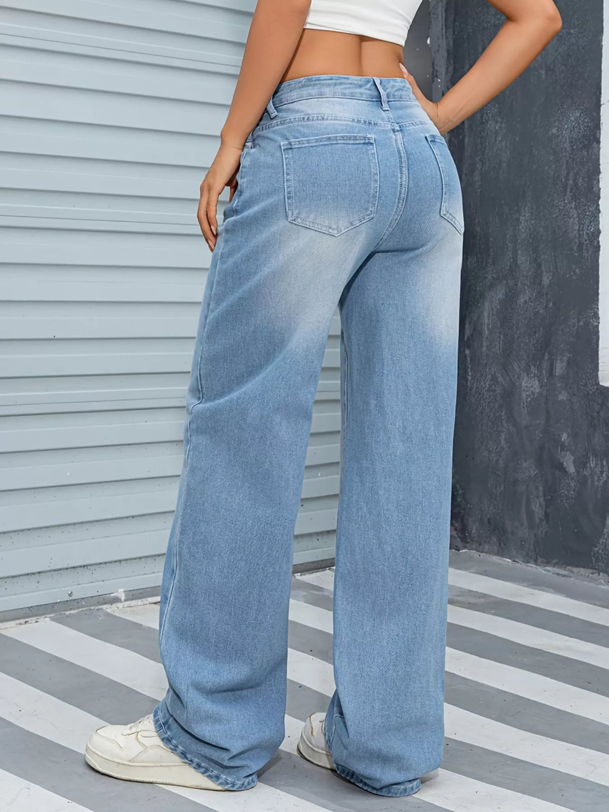Sky blue wide leg jeans full length view