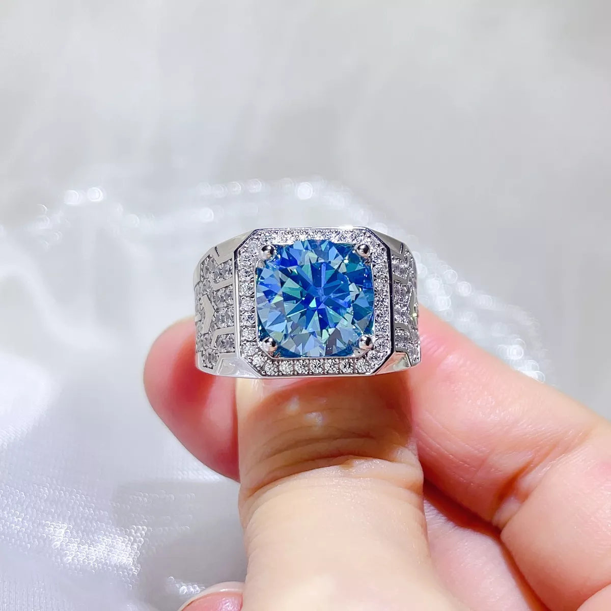 Starglow moissanite sterling silver ring with pastel blue stone