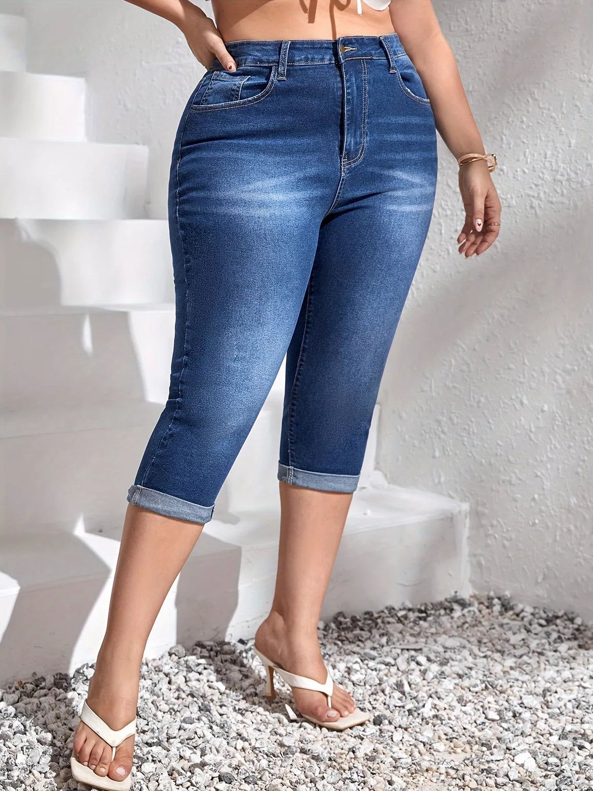 Back view of high waist plus size capri denim