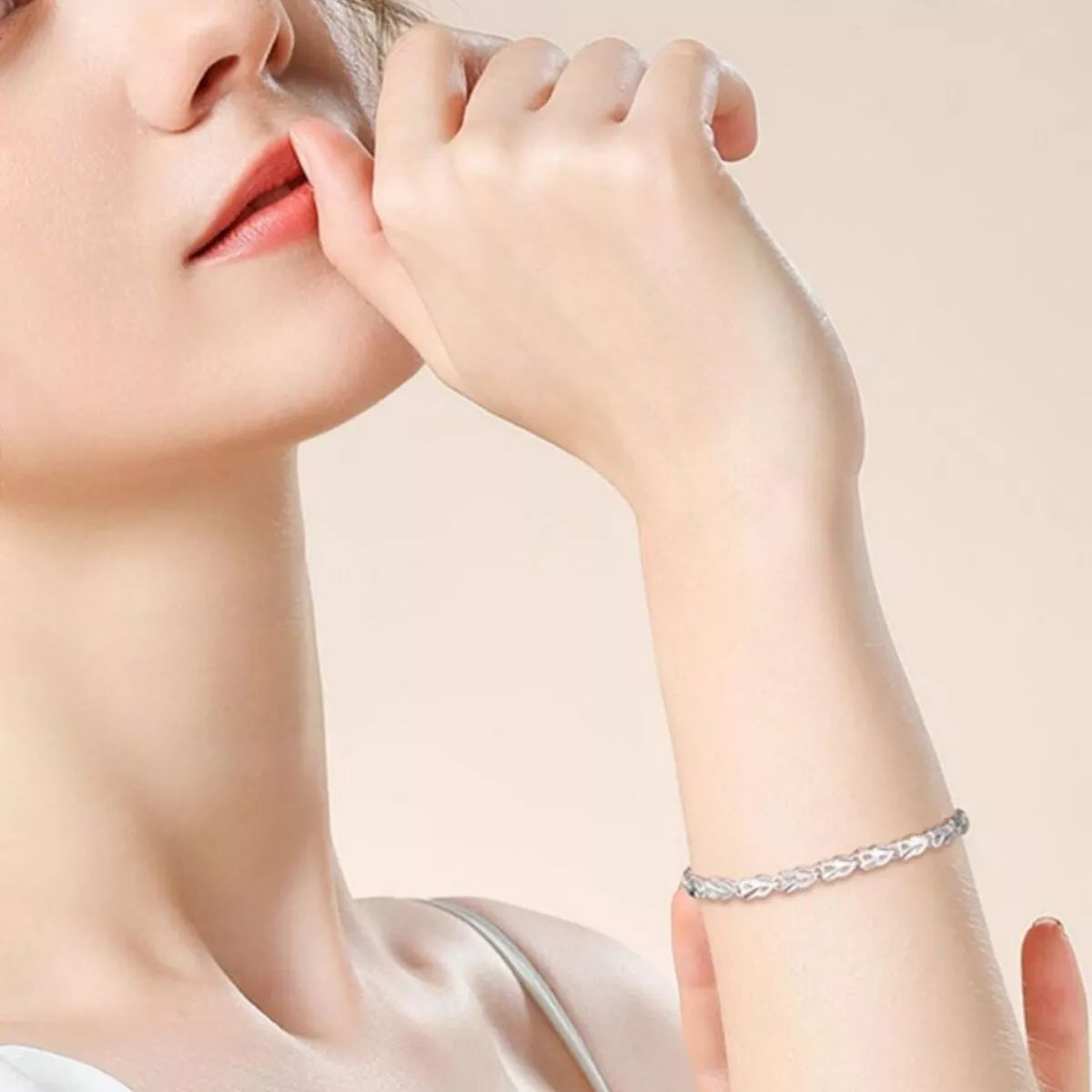 Sterling silver bracelet styled with a stacked wrist