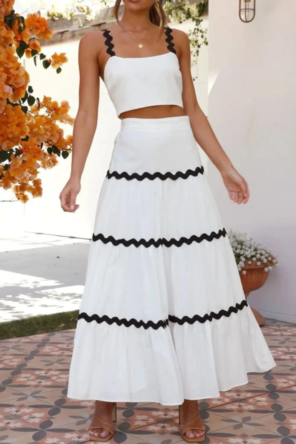Flowing white skirt of the matching set