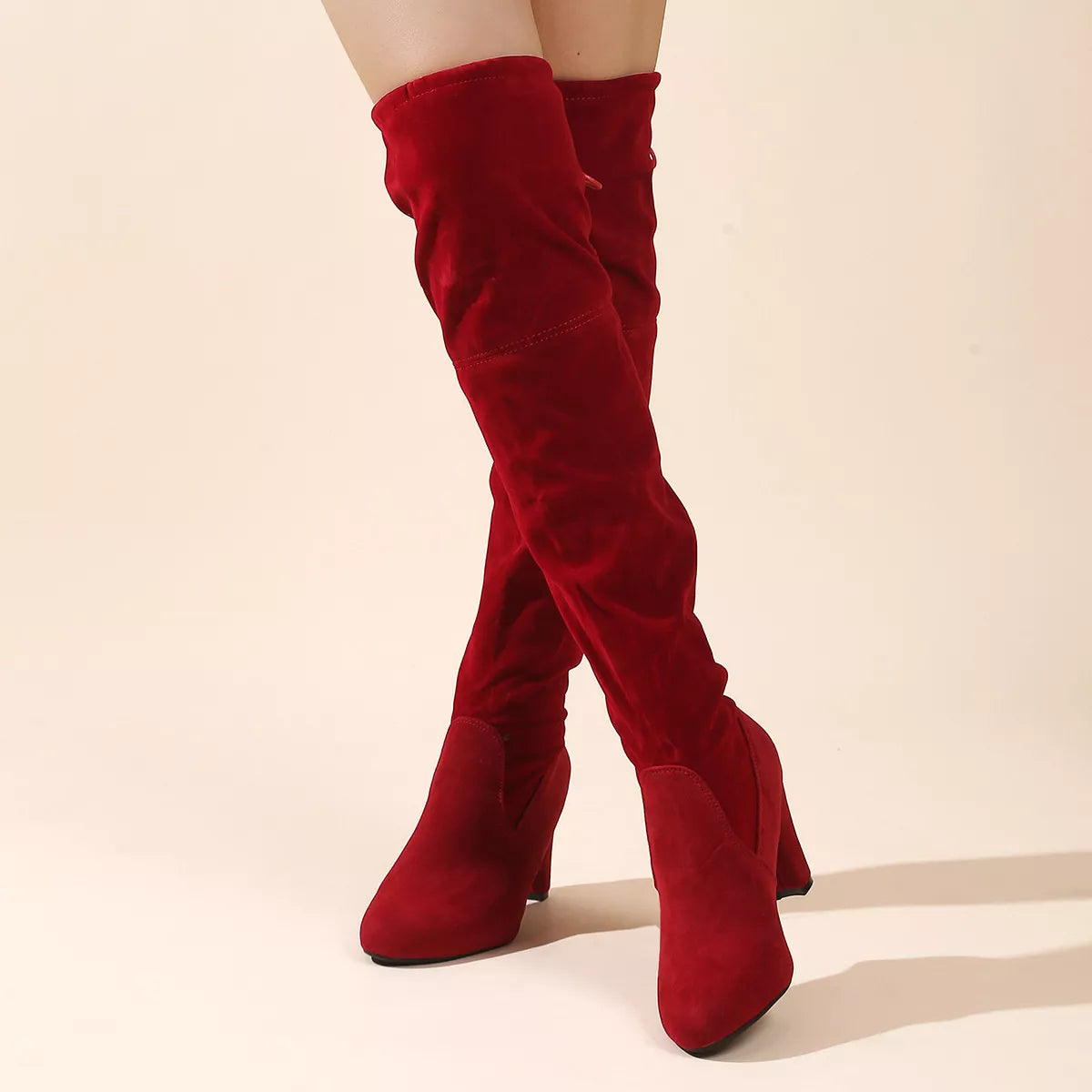 Over the knee high heel suede boots toe detail