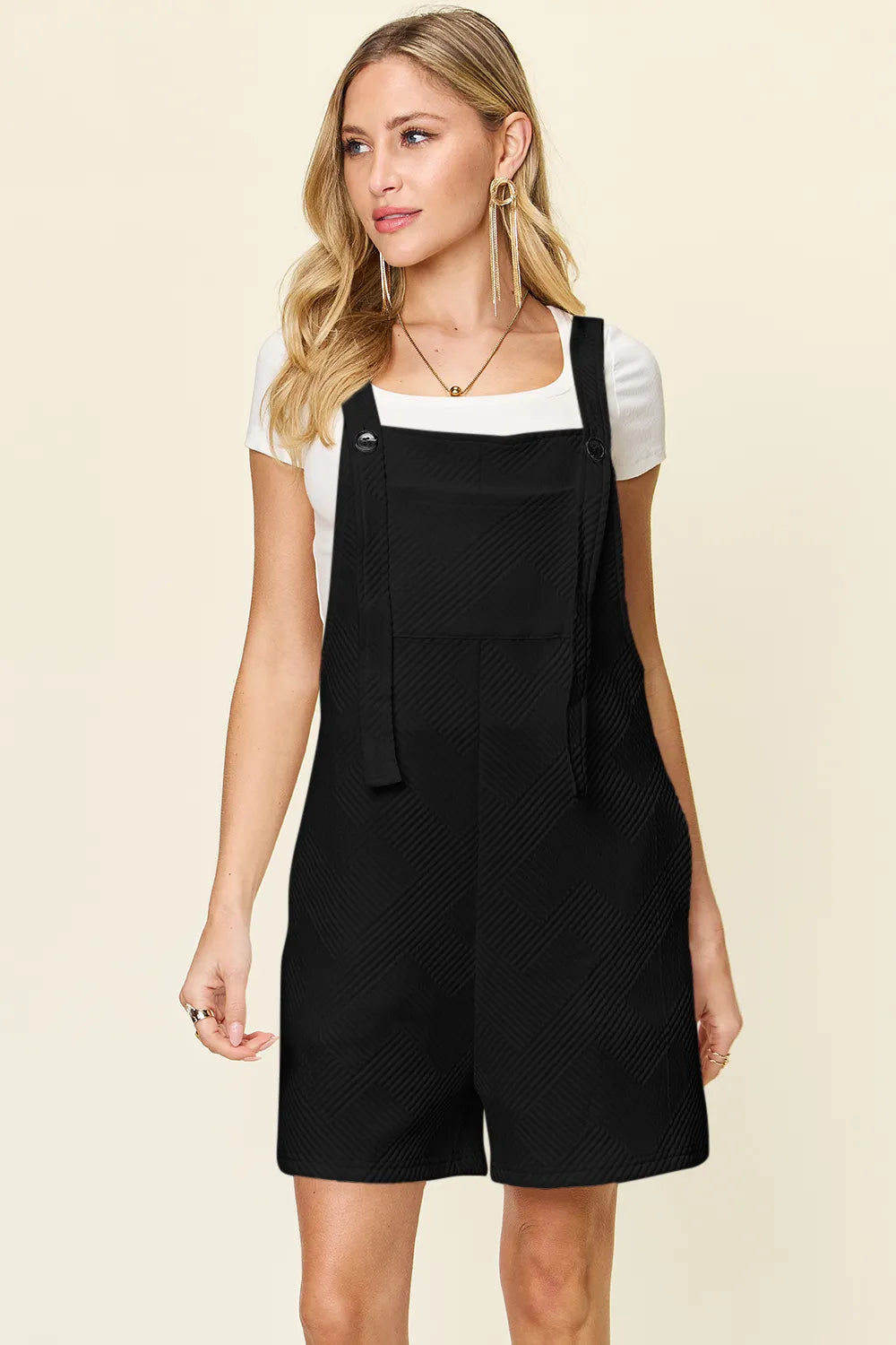 Textured romper hem detail