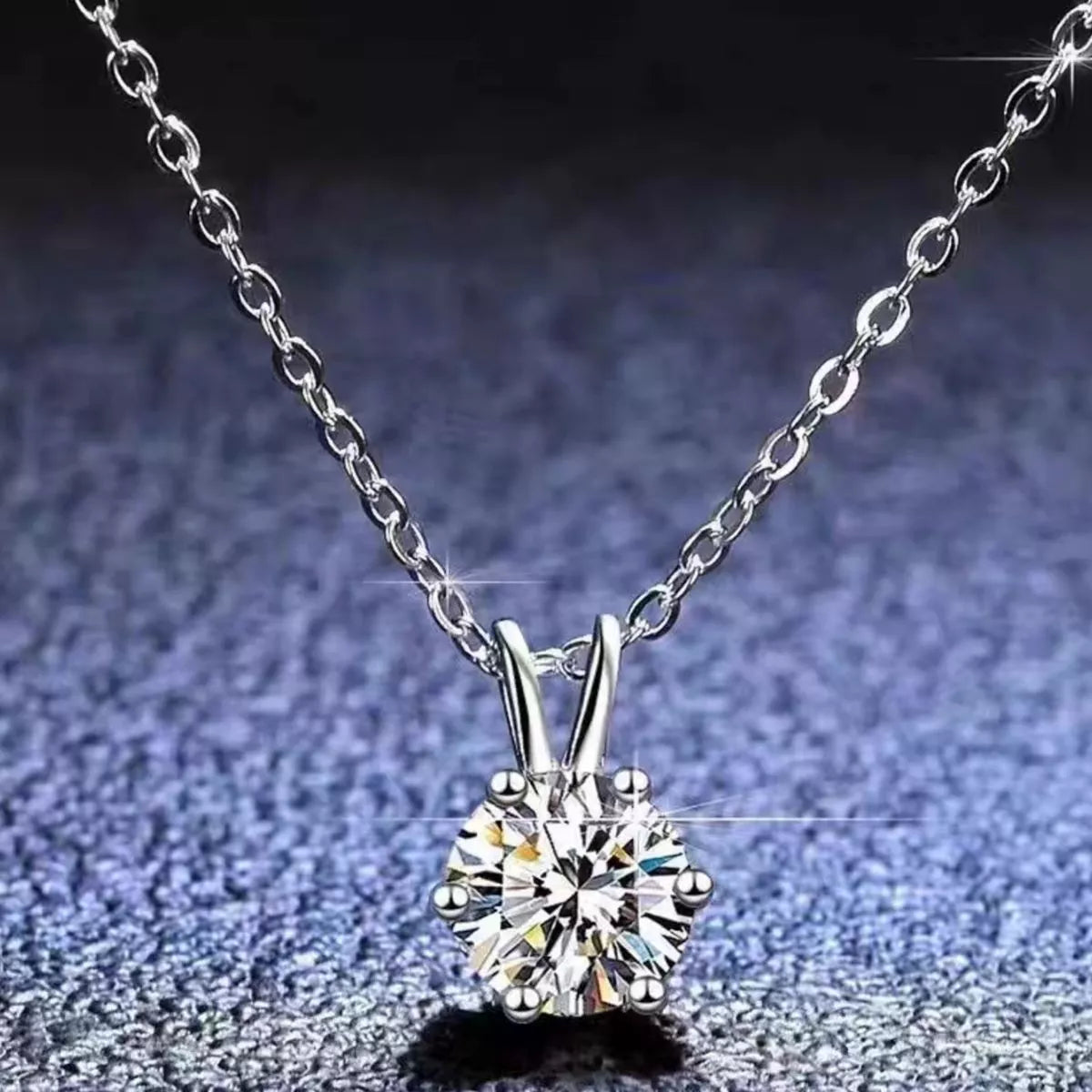 Sterling silver chain and clasp detail on the pendant necklace
