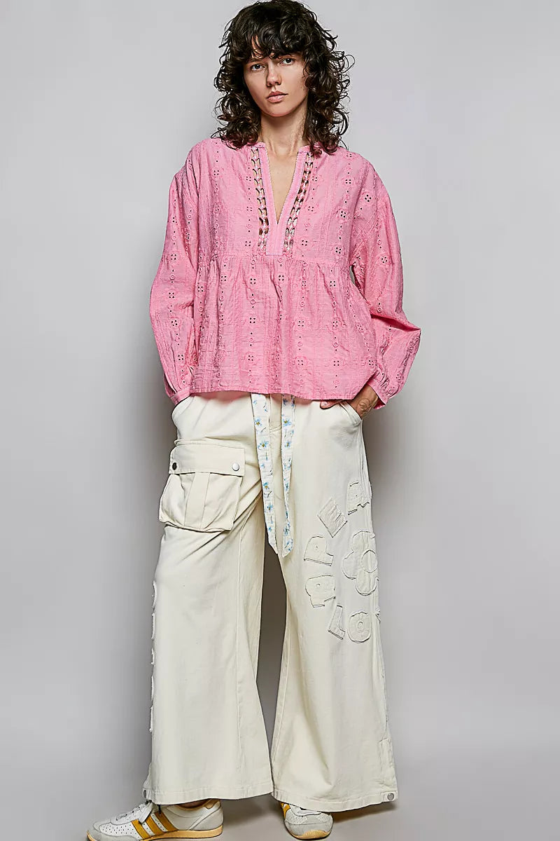 Long sleeve volume and empire seam on the pink blouse