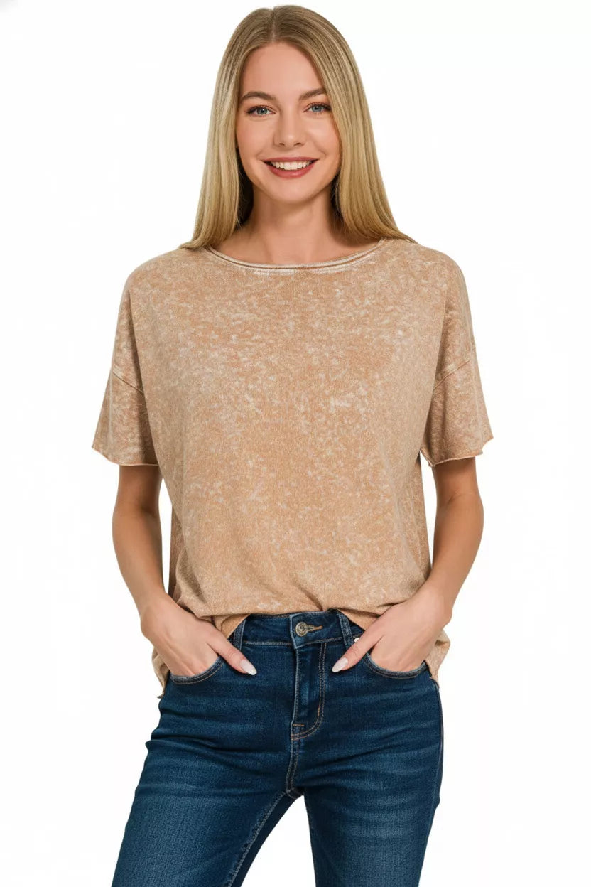 Relaxed fit cotton top styled with denim, side angle