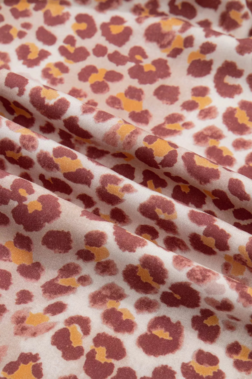 Leopard print short dress three quarter view