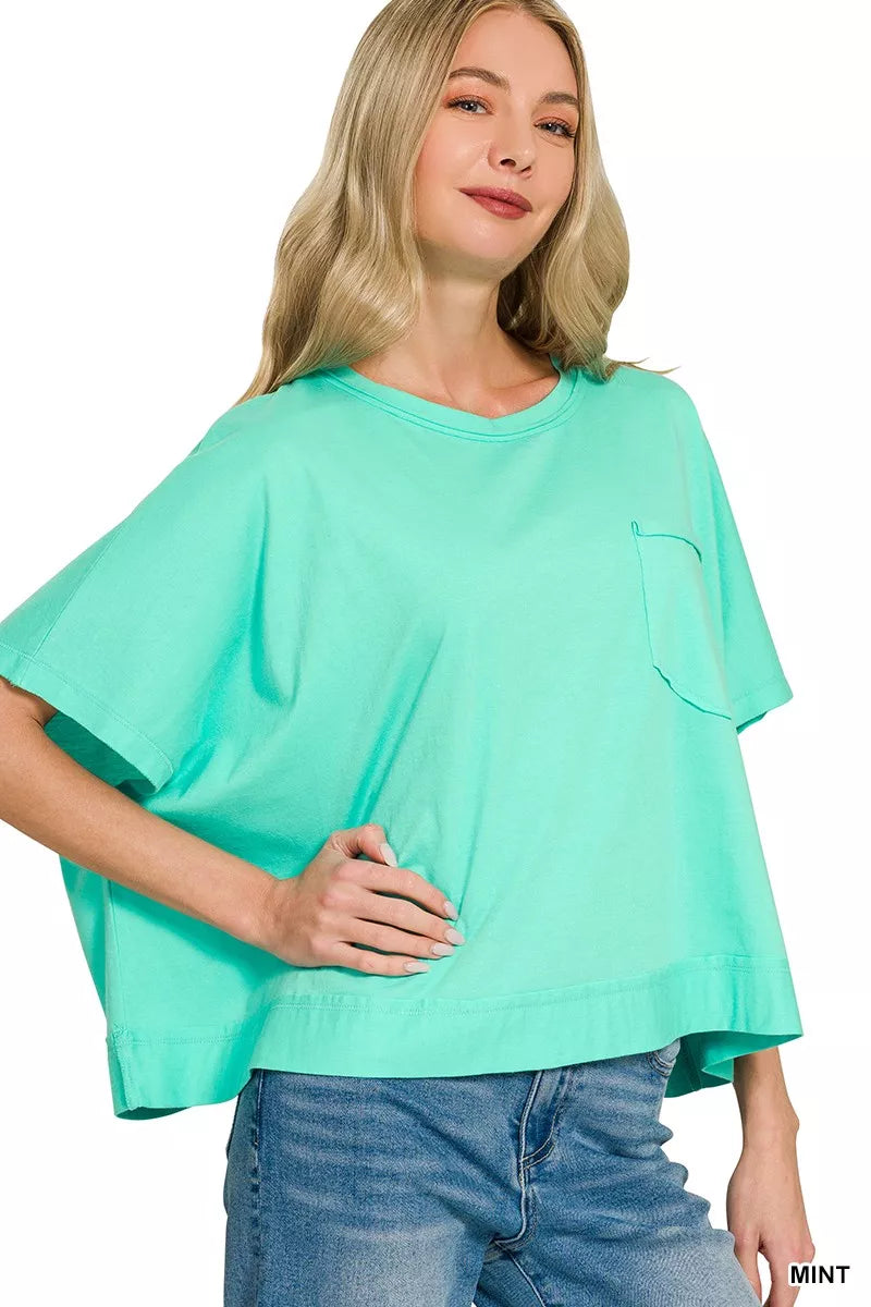 Exposed seam detail on the mint cotton boxy top