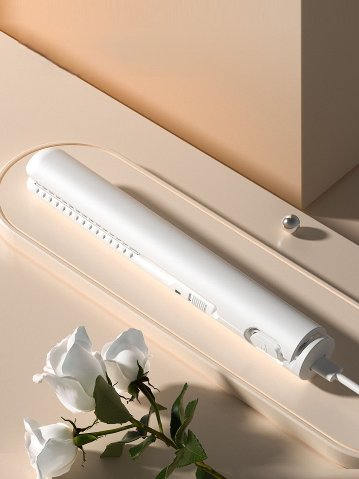 Straightener smoothing a hair section