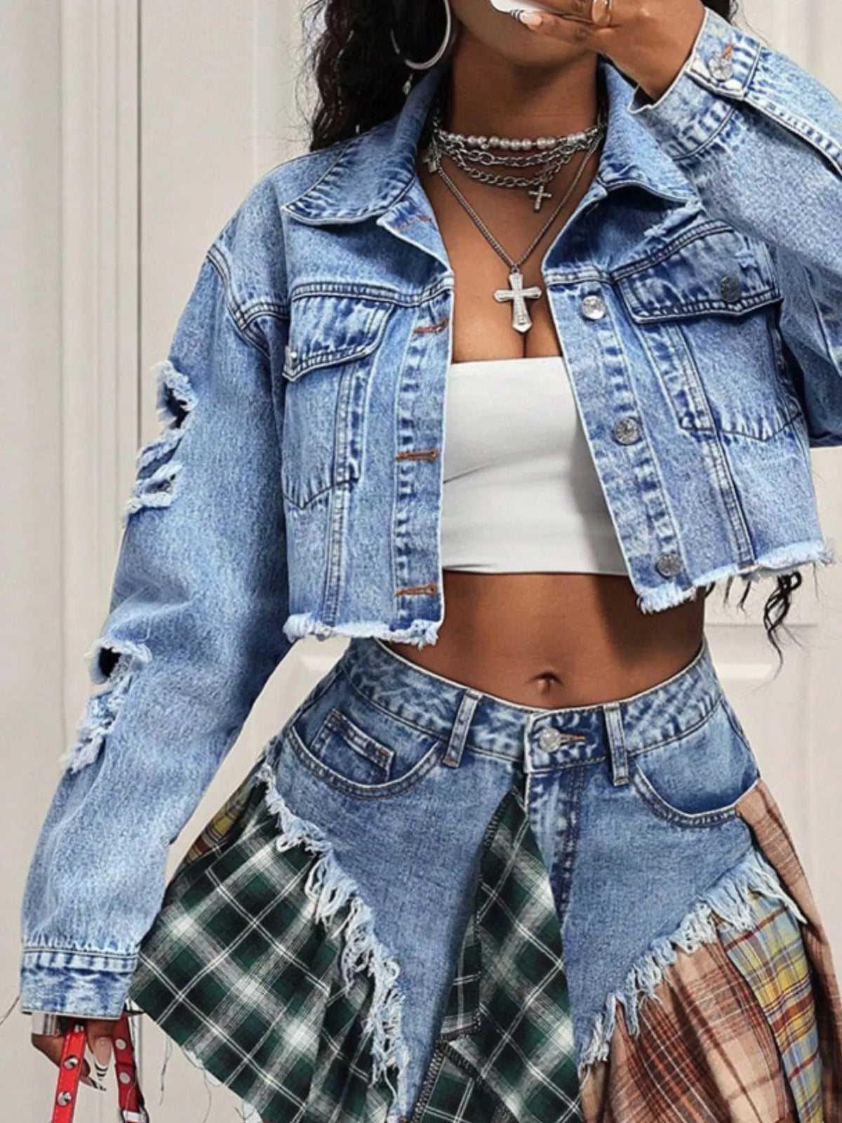 Blue distressed cropped denim jacket full length view