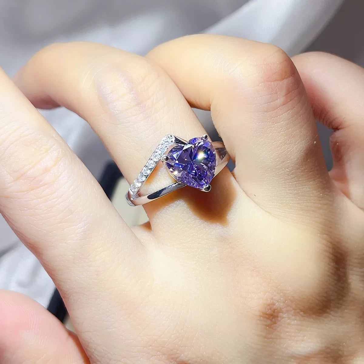 Moissanite ring displayed with its matching gift box