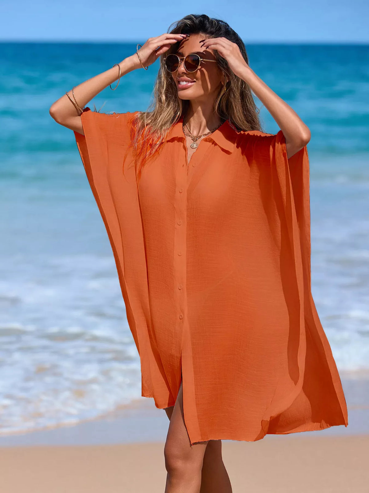 Button up beach cover up styled on the shoreline