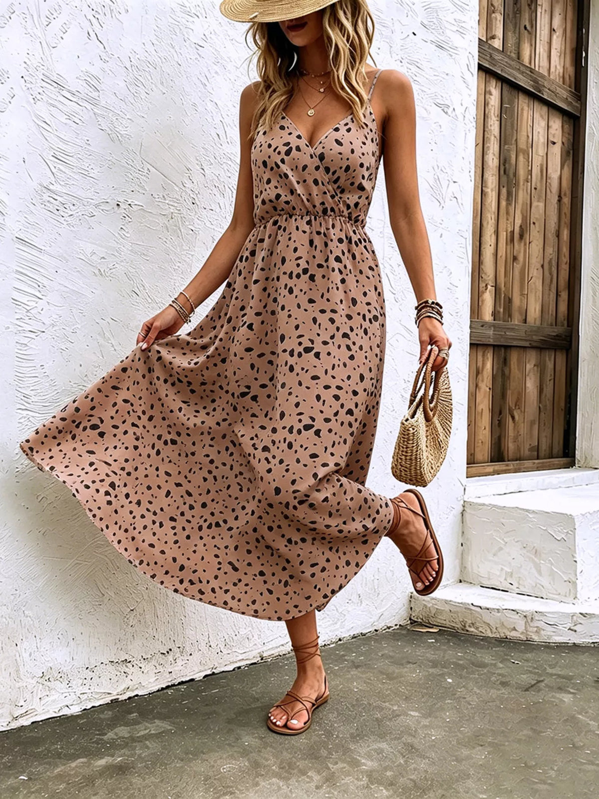 Back view of the ruched floral midi dress in the second colourway