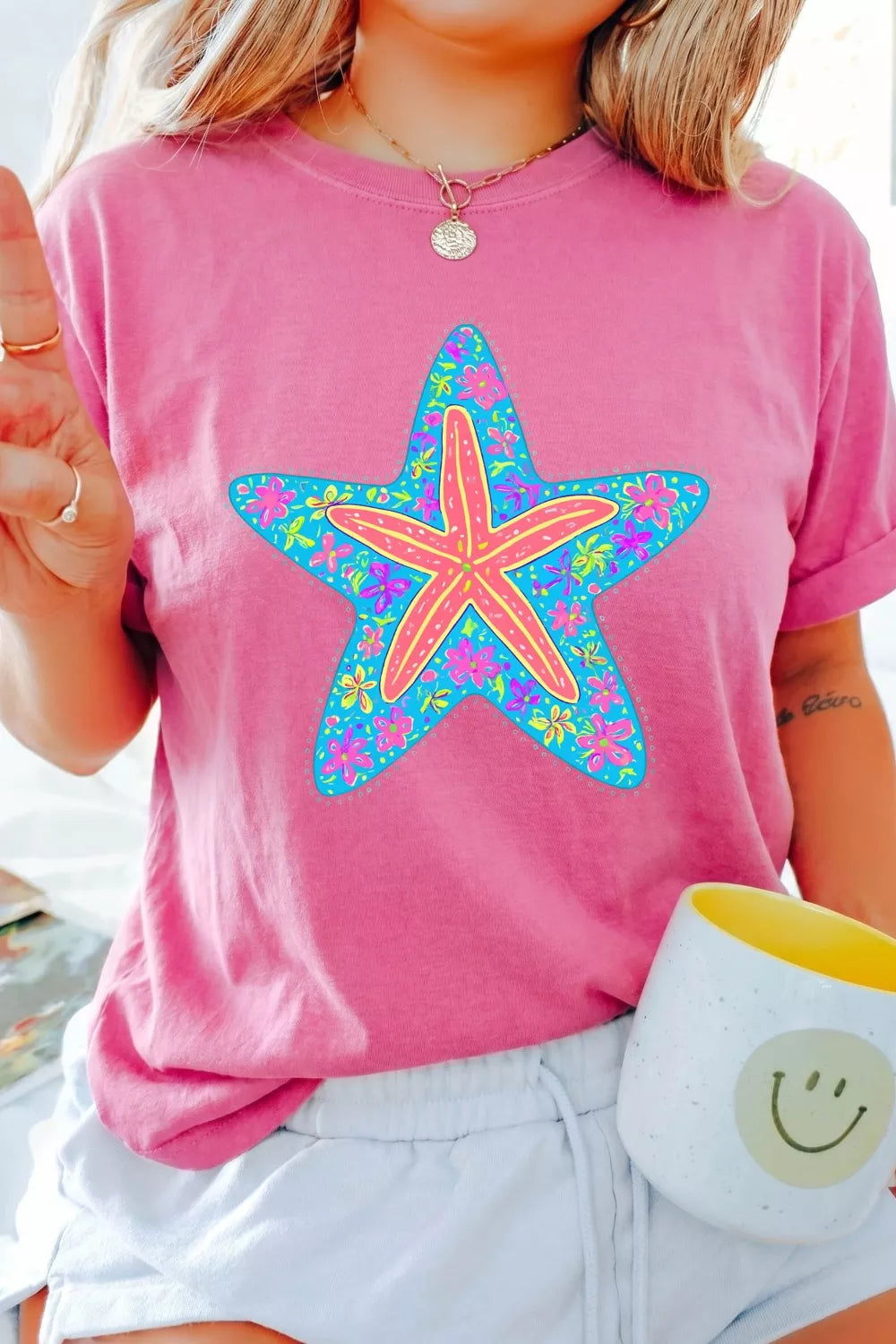 Relaxed fit starfish tee laid flat, full garment view