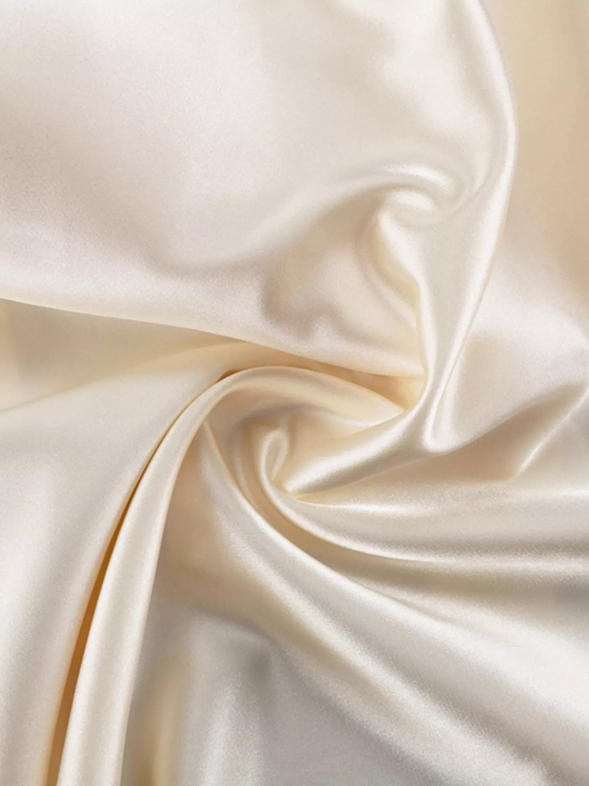 Vintage Reverie satin dress in beige on a model
