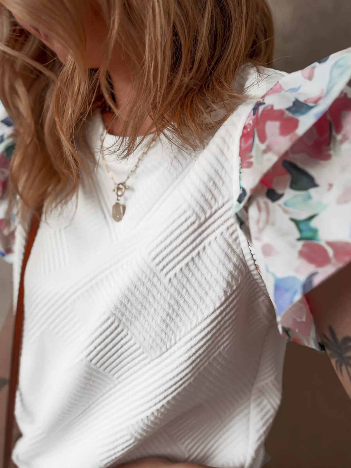 White abstract print tiered ruffle sleeve top full length view