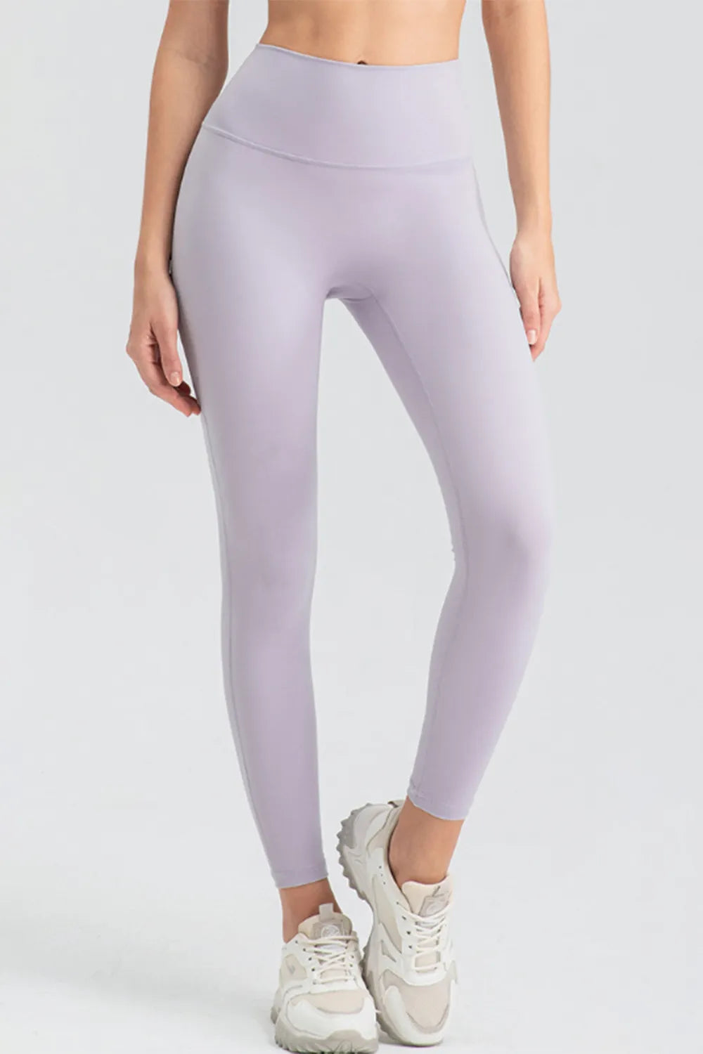 Skinny active pants styled with sweater