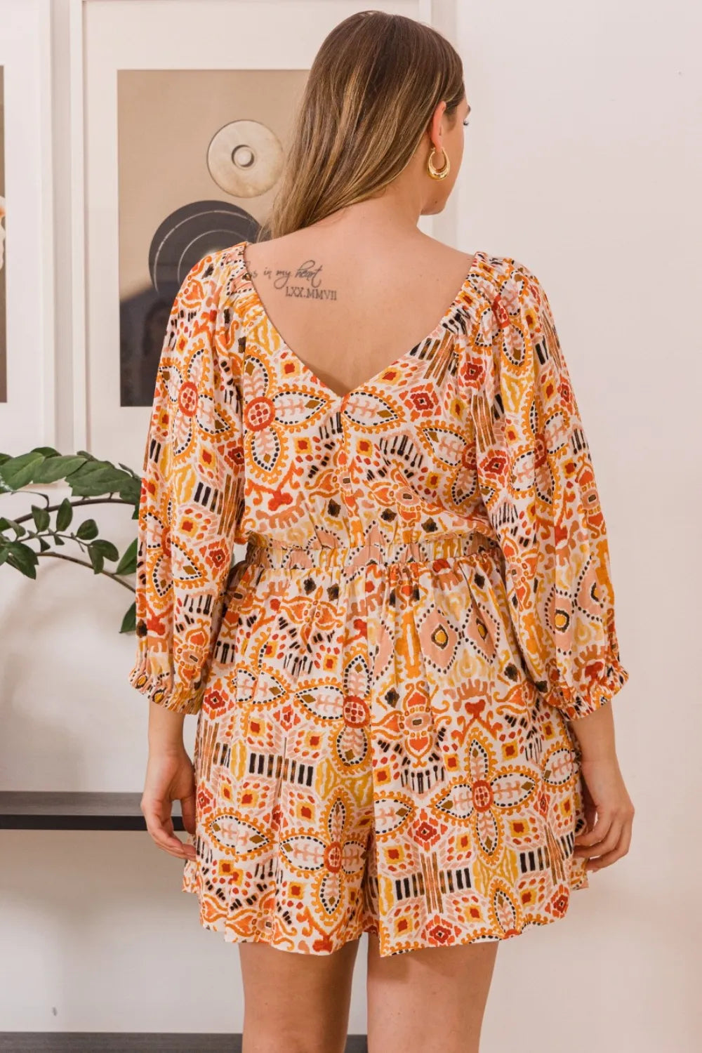 Printed Ruff Sleeve Romper with Pockets back view