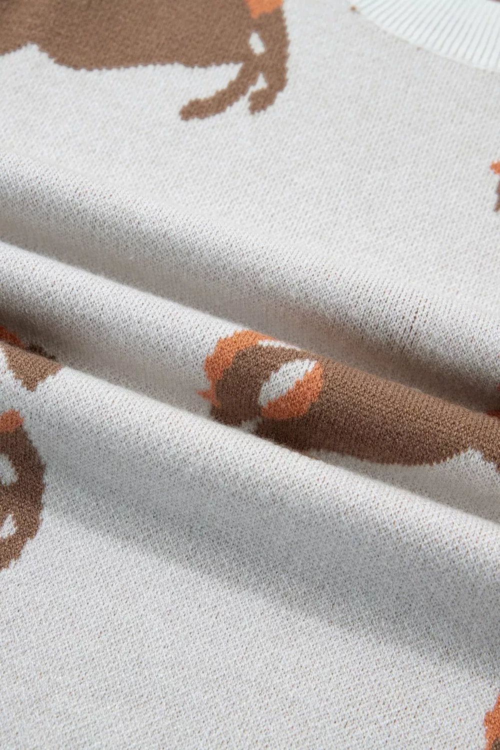 Soft beige puff sleeve pullover detail