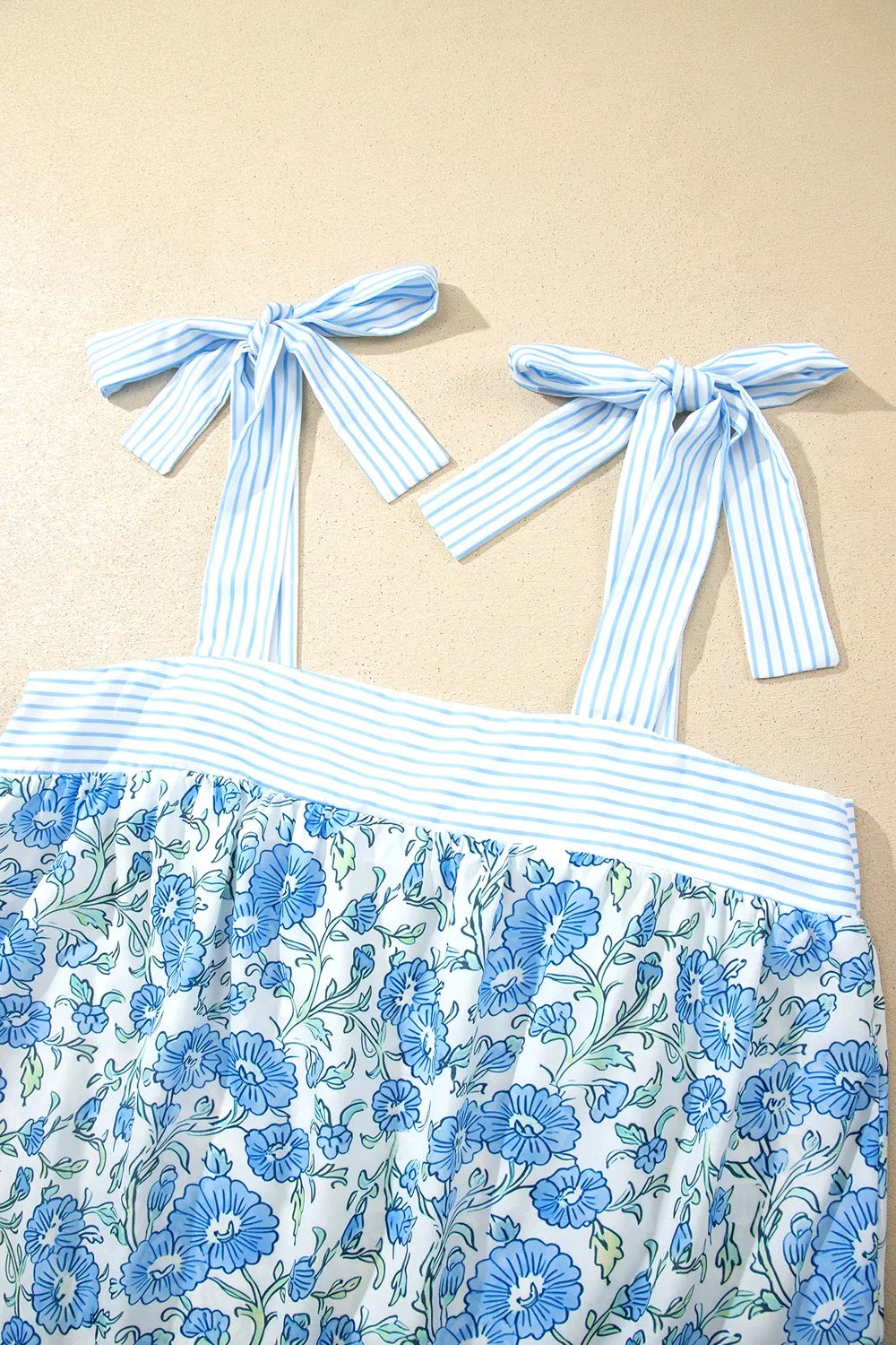 Floral tie strap ruffle detail close up