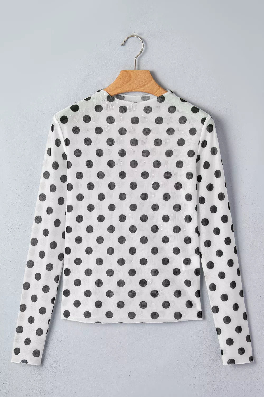 White polka dot sheer mesh long sleeve top styled view