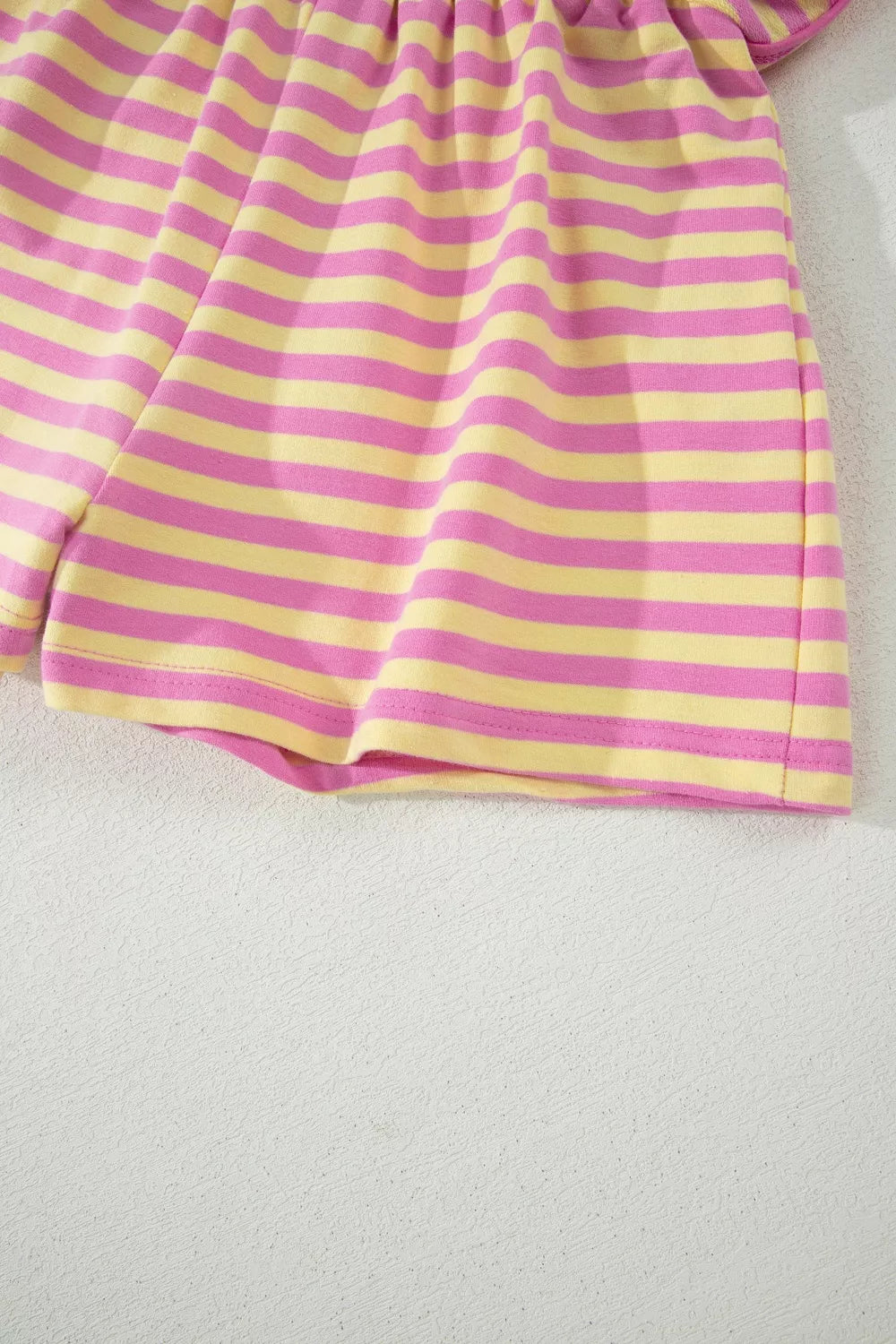 Striped round neck tee and shorts styling angle