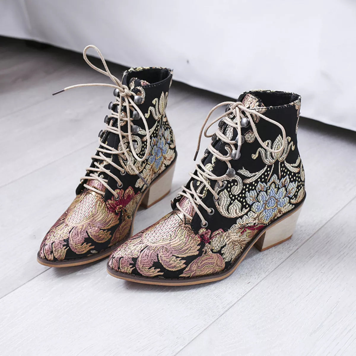 Gold embroidered floral lace up ankle boots back heel view