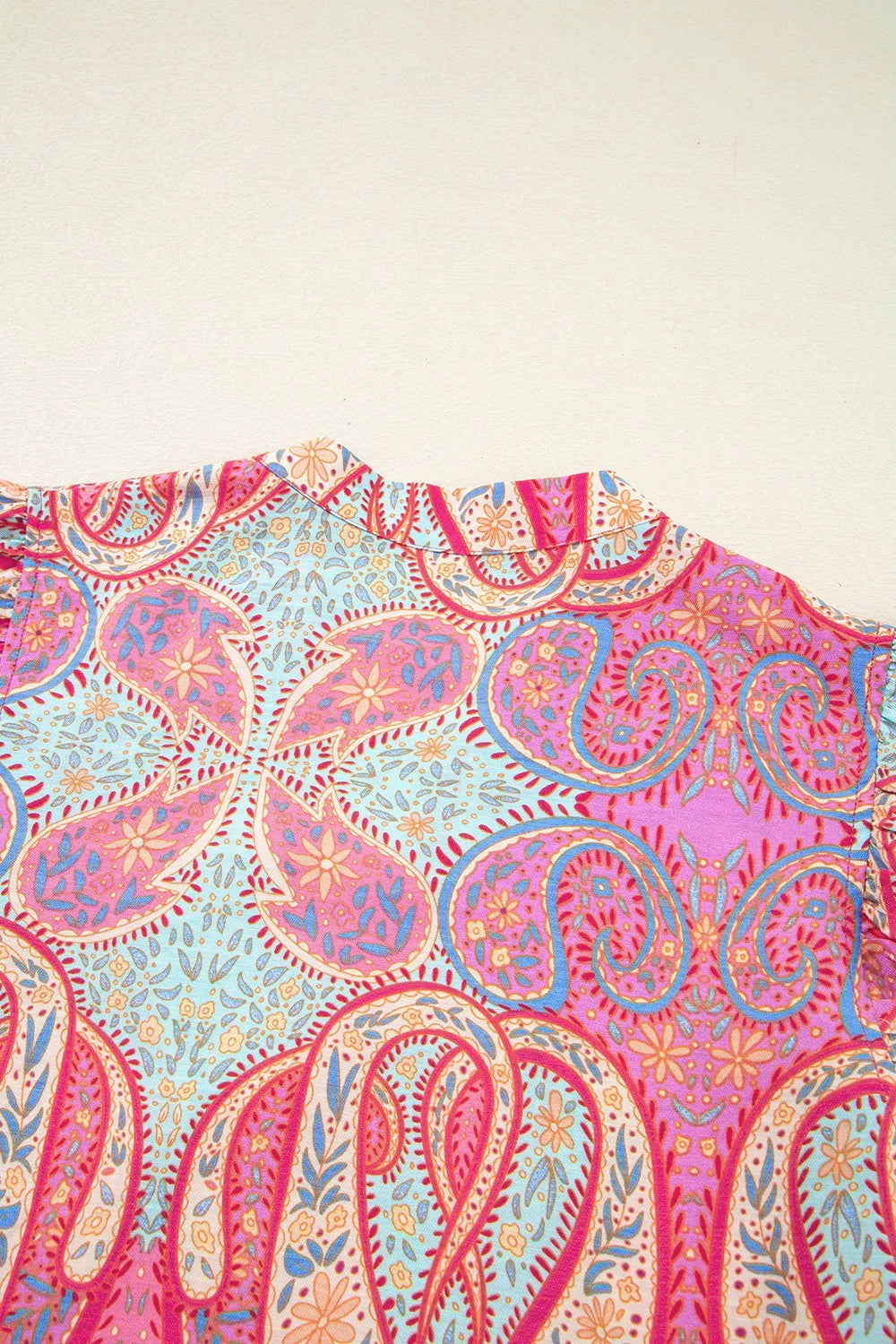 Ruffle sleeve detail on paisley midi dress
