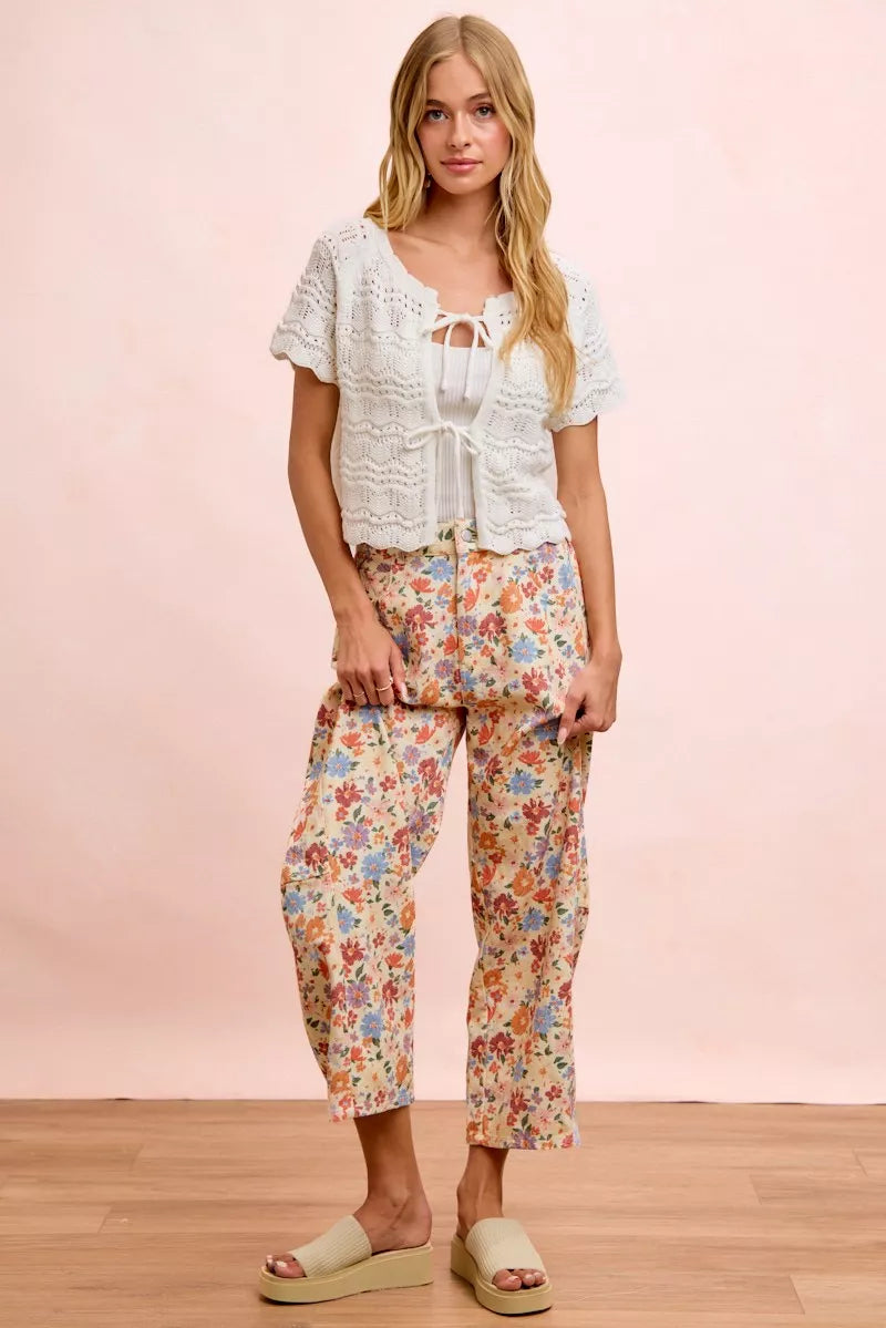 Waist and hip fit view of the drawstring floral pants
