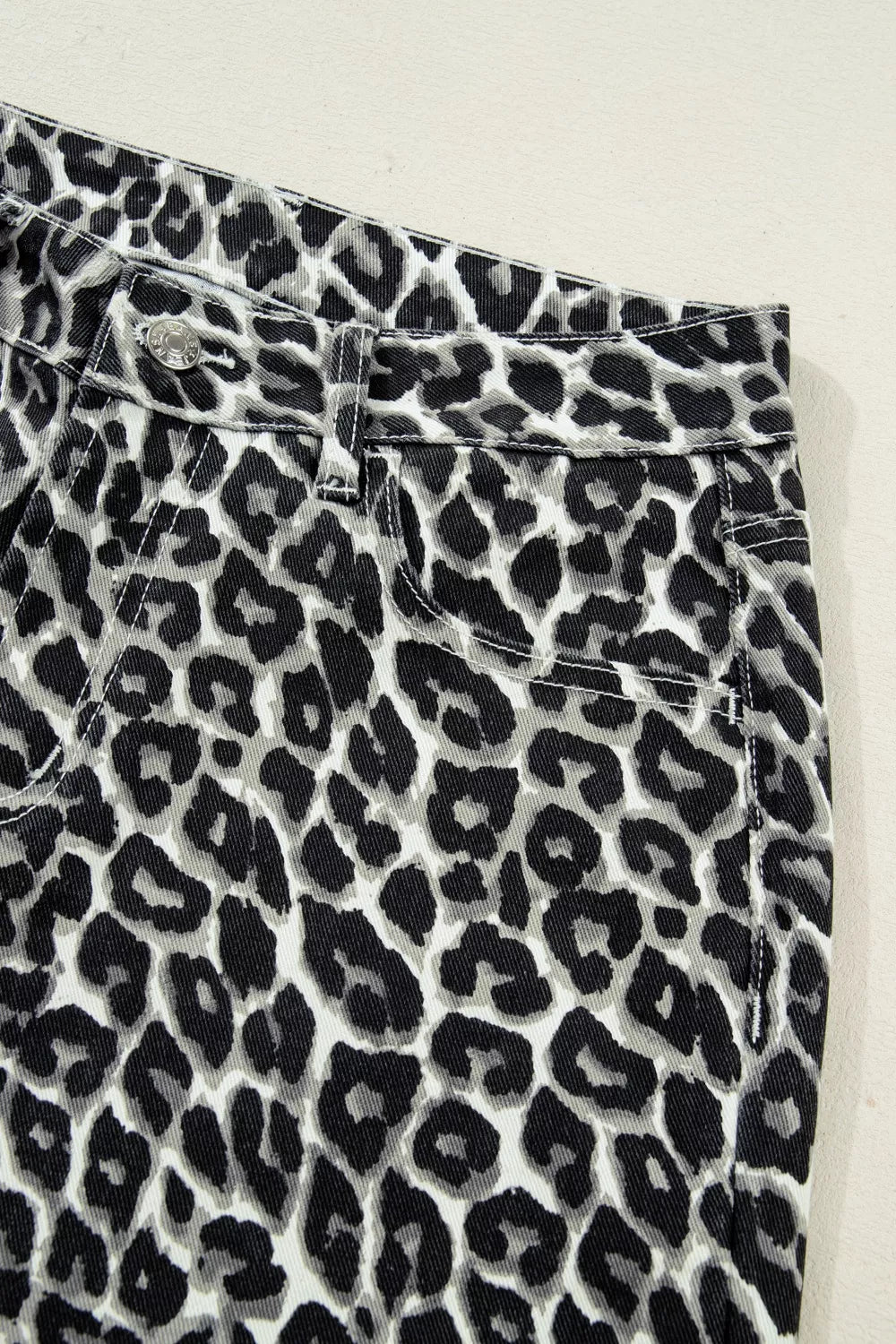 Rear styling of leopard print barrel jeans