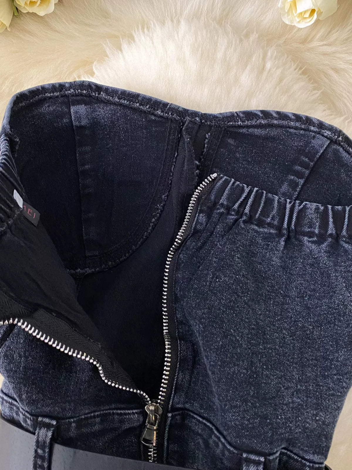 Blue strapless denim romper with diamante detail styled view