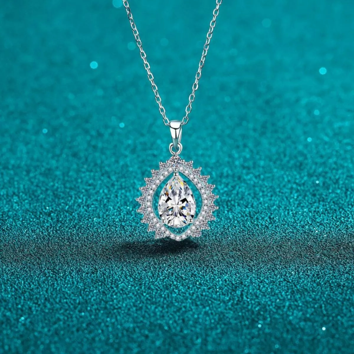 Moissanite teardrop necklace in sterling silver front view