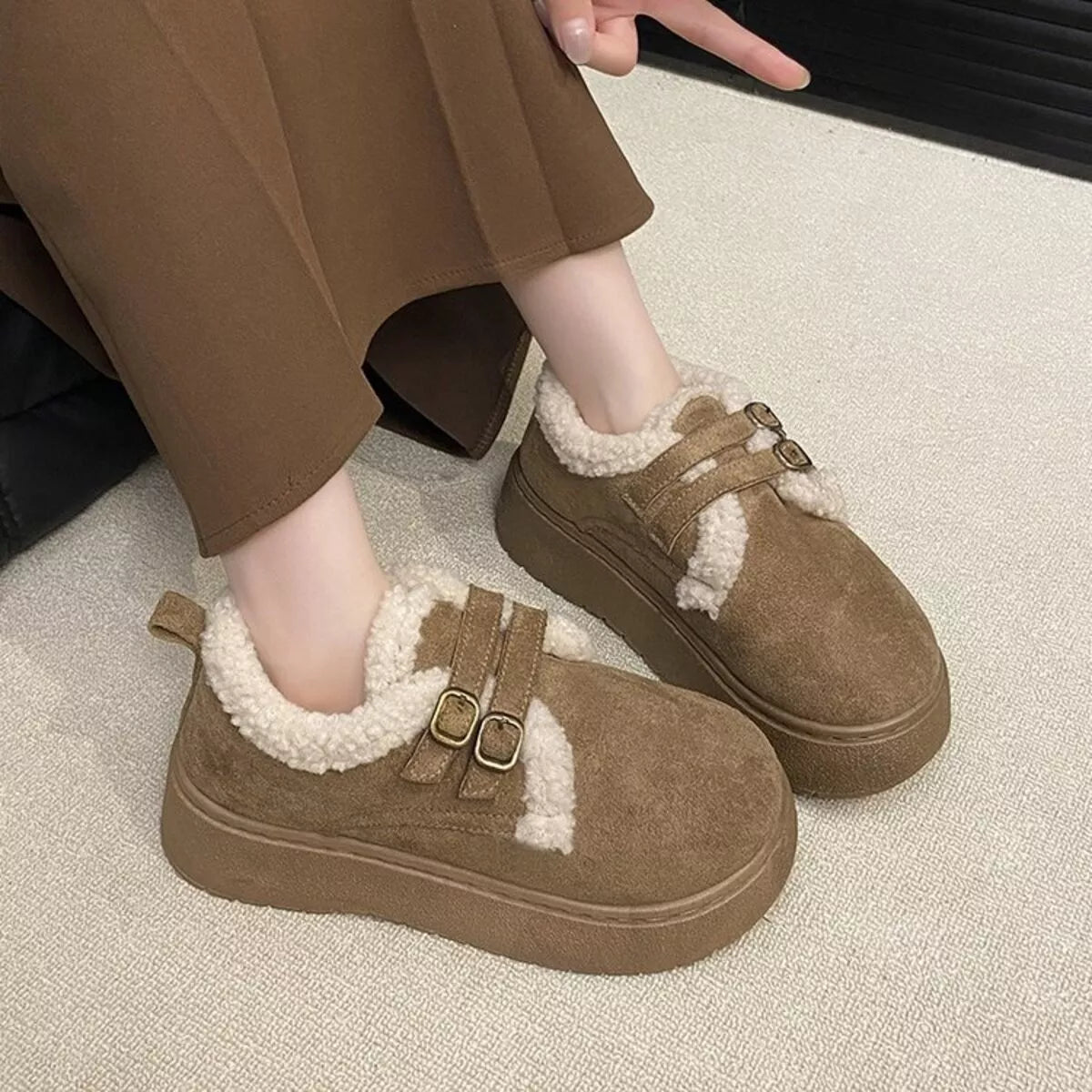 double buckle fur lined winter ankle boots top down view