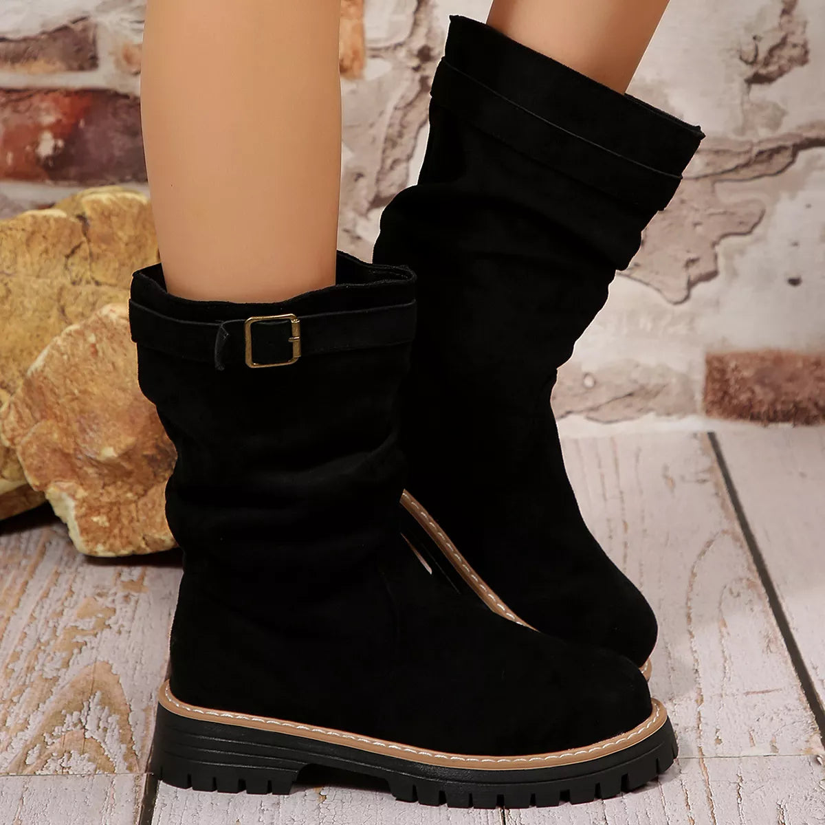 Buckle accent slouch boots side profile