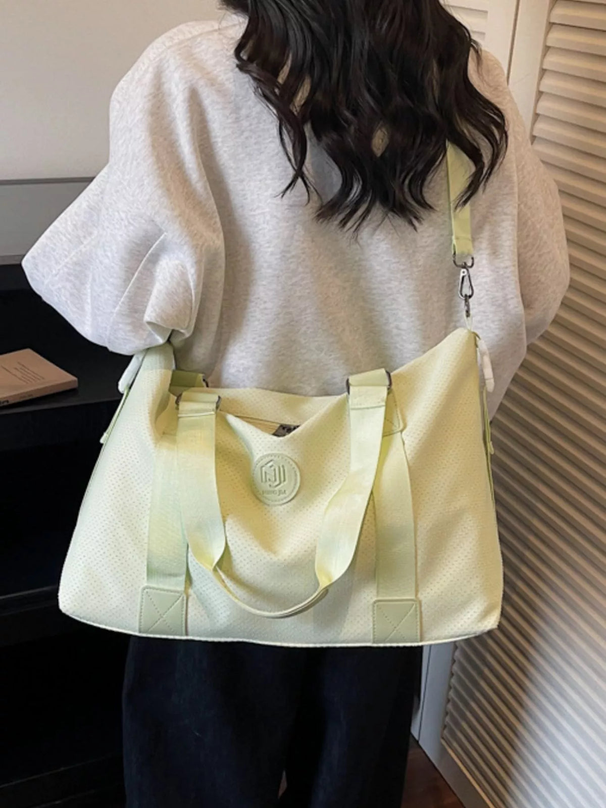 Duffel bag adjustable strap detail