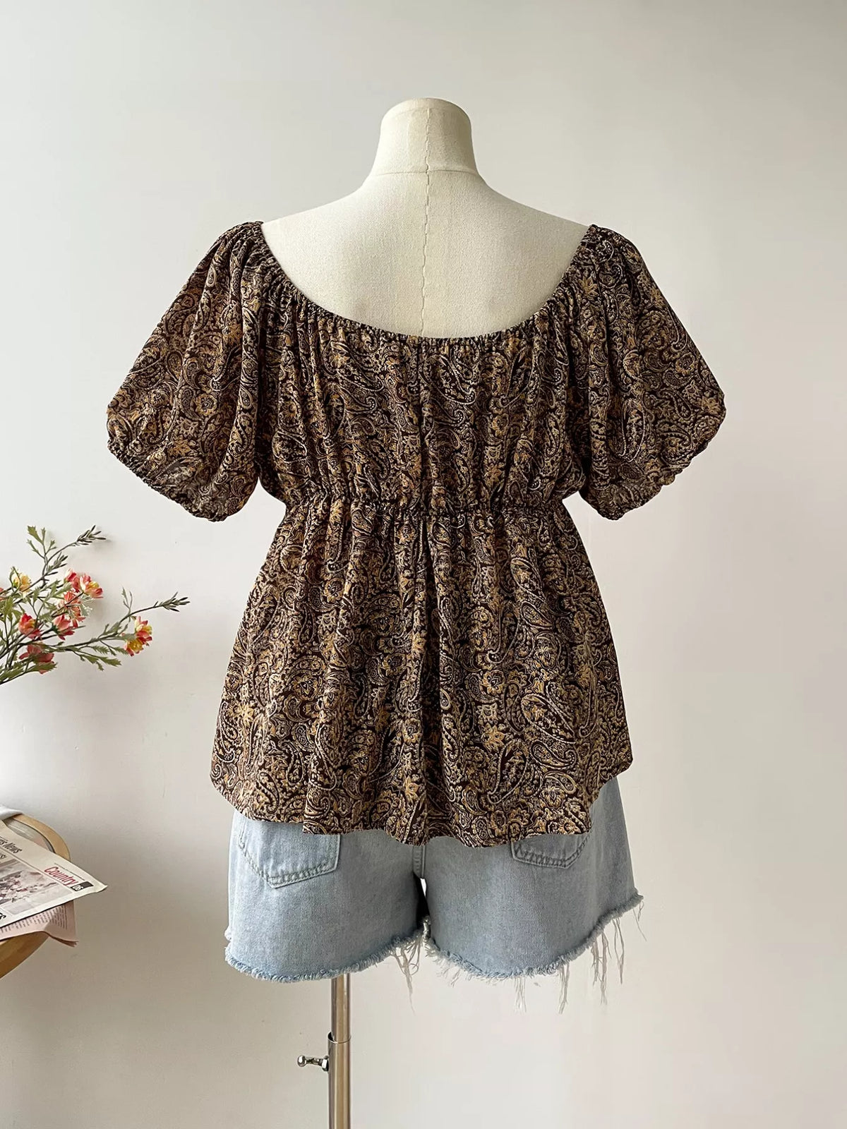 Plus size paisley print blouse back view