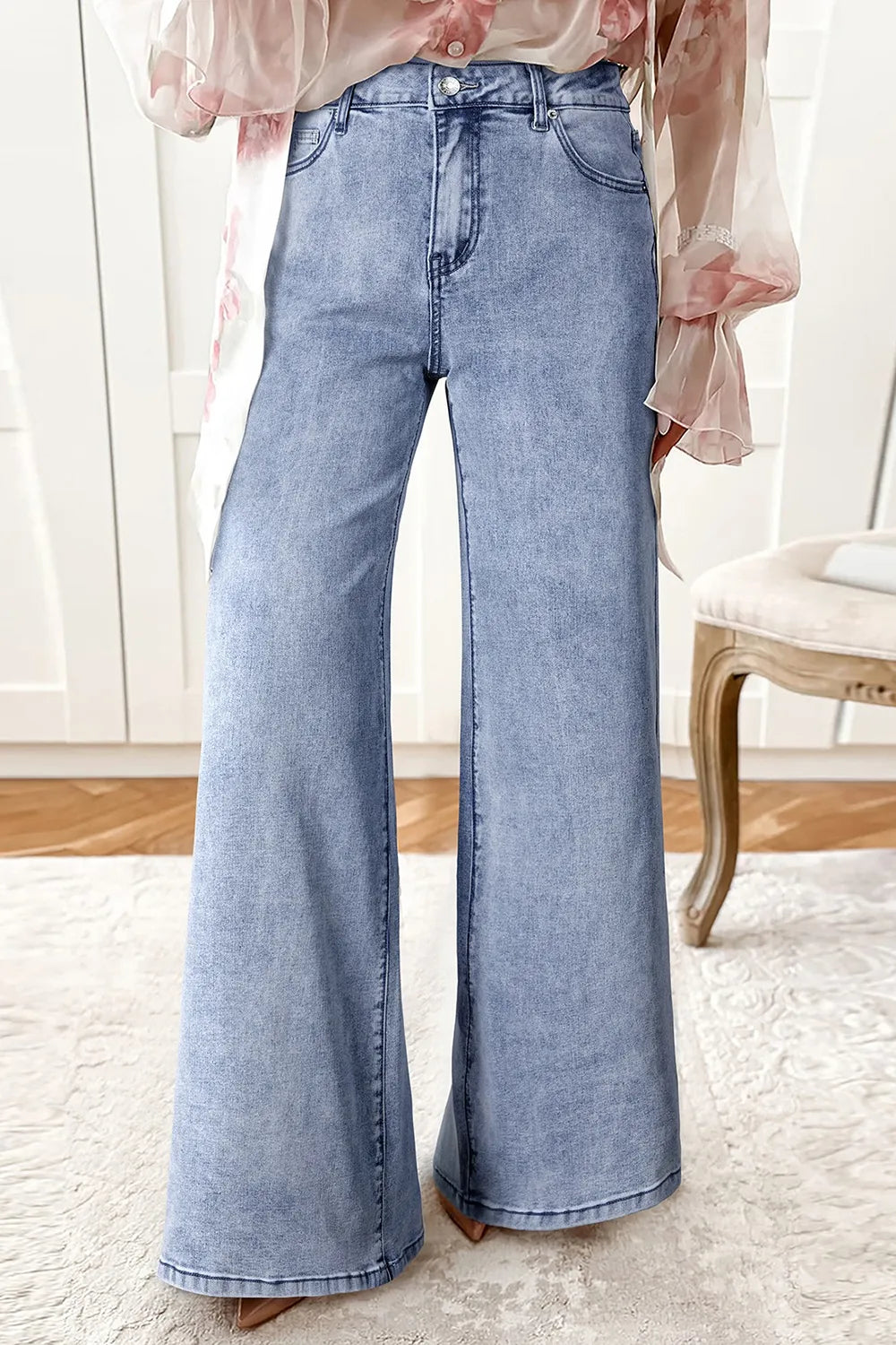 Back view of light blue wide leg flare jeans
