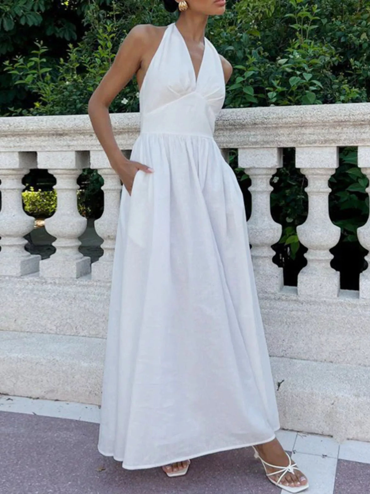 white halter neck tied flowy maxi dress back view