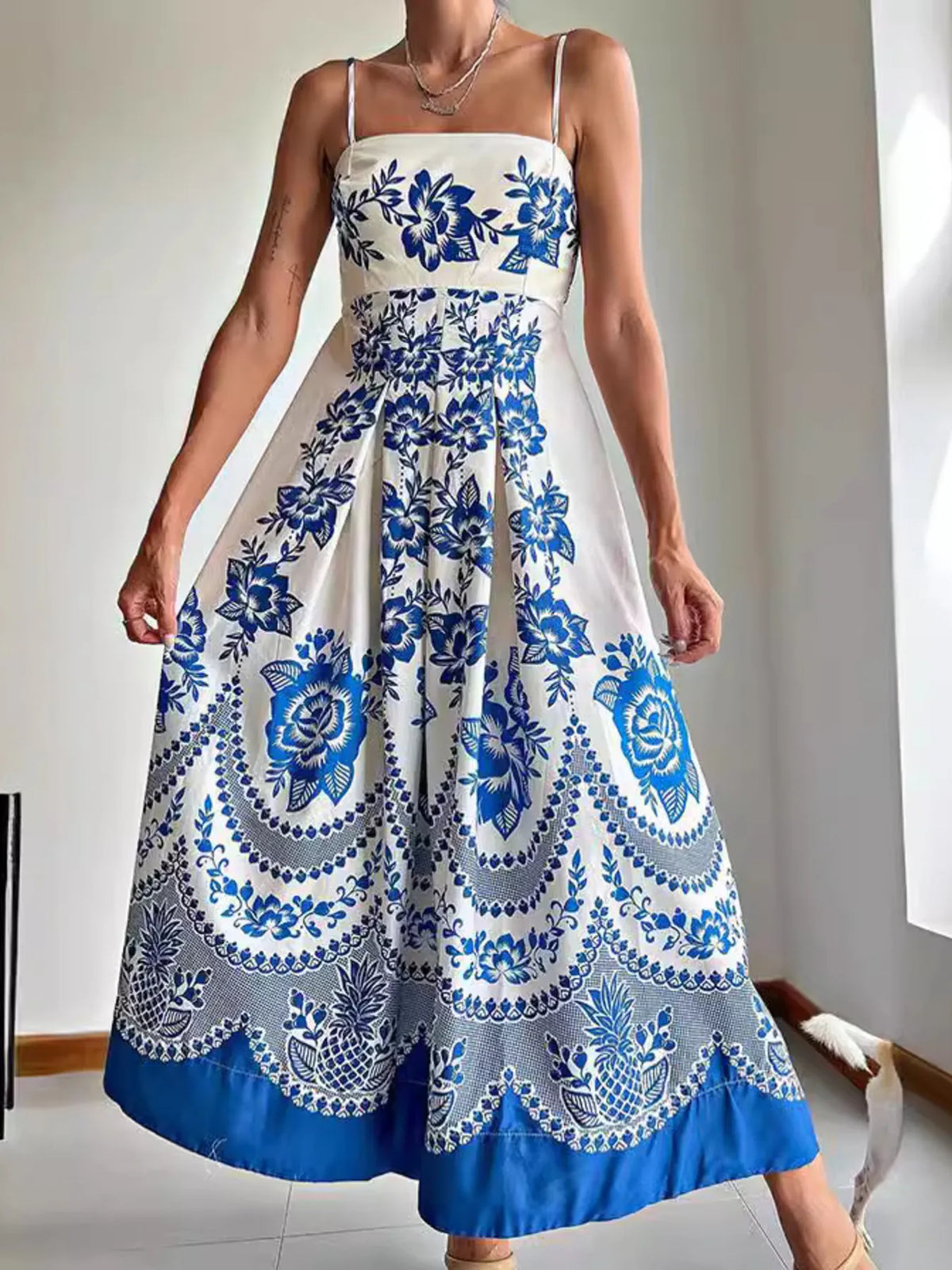 Blue printed spaghetti strap maxi dress side view