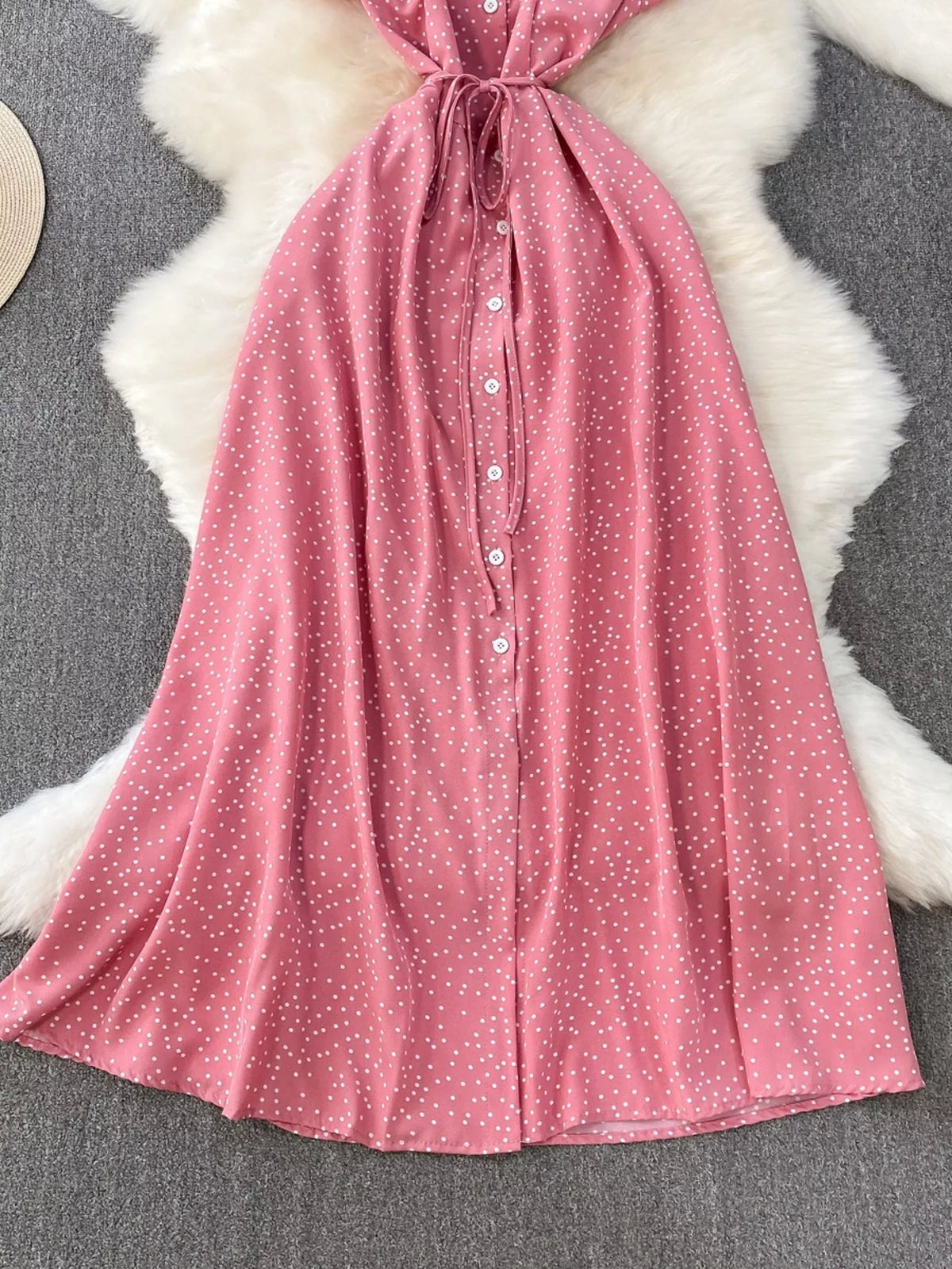 Pink polka dot belted maxi dress back view