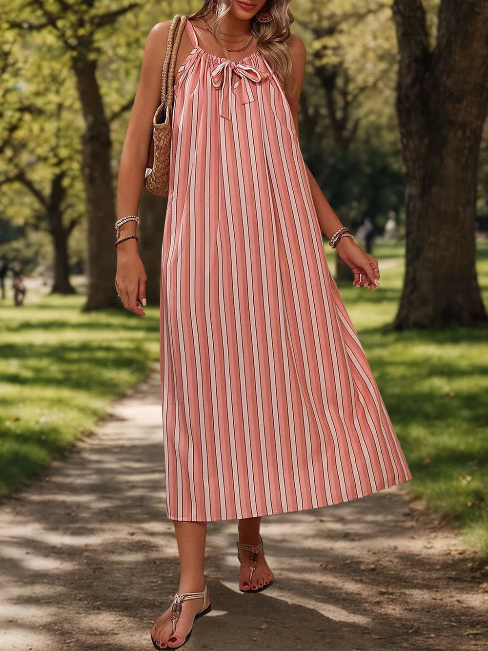 Striped midi cami dress on model styled coastal