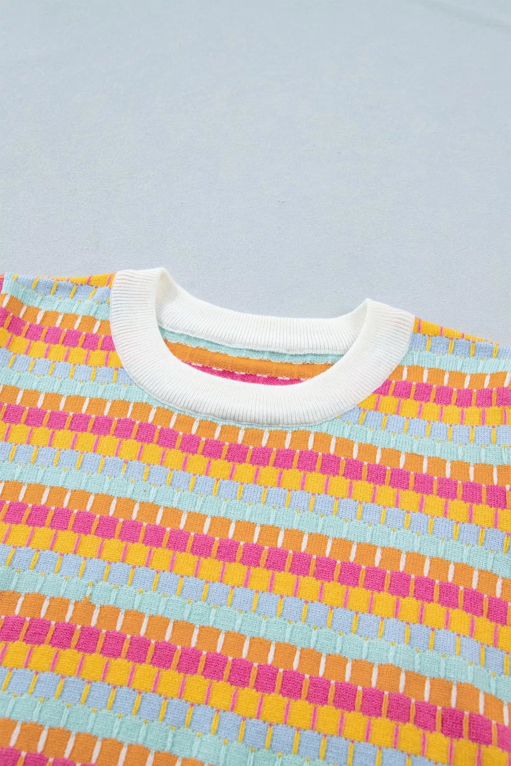 Colorful striped short sleeve sweater styled look